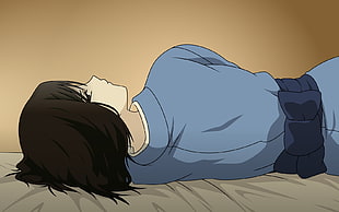woman in blue dress lying on bed