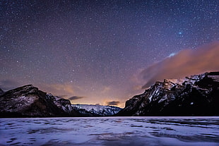 landscape photography of mountain under starry night