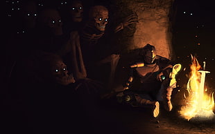 knight sitting in front of fire against brown stone surrounded by skeleton at nightime wallpaper