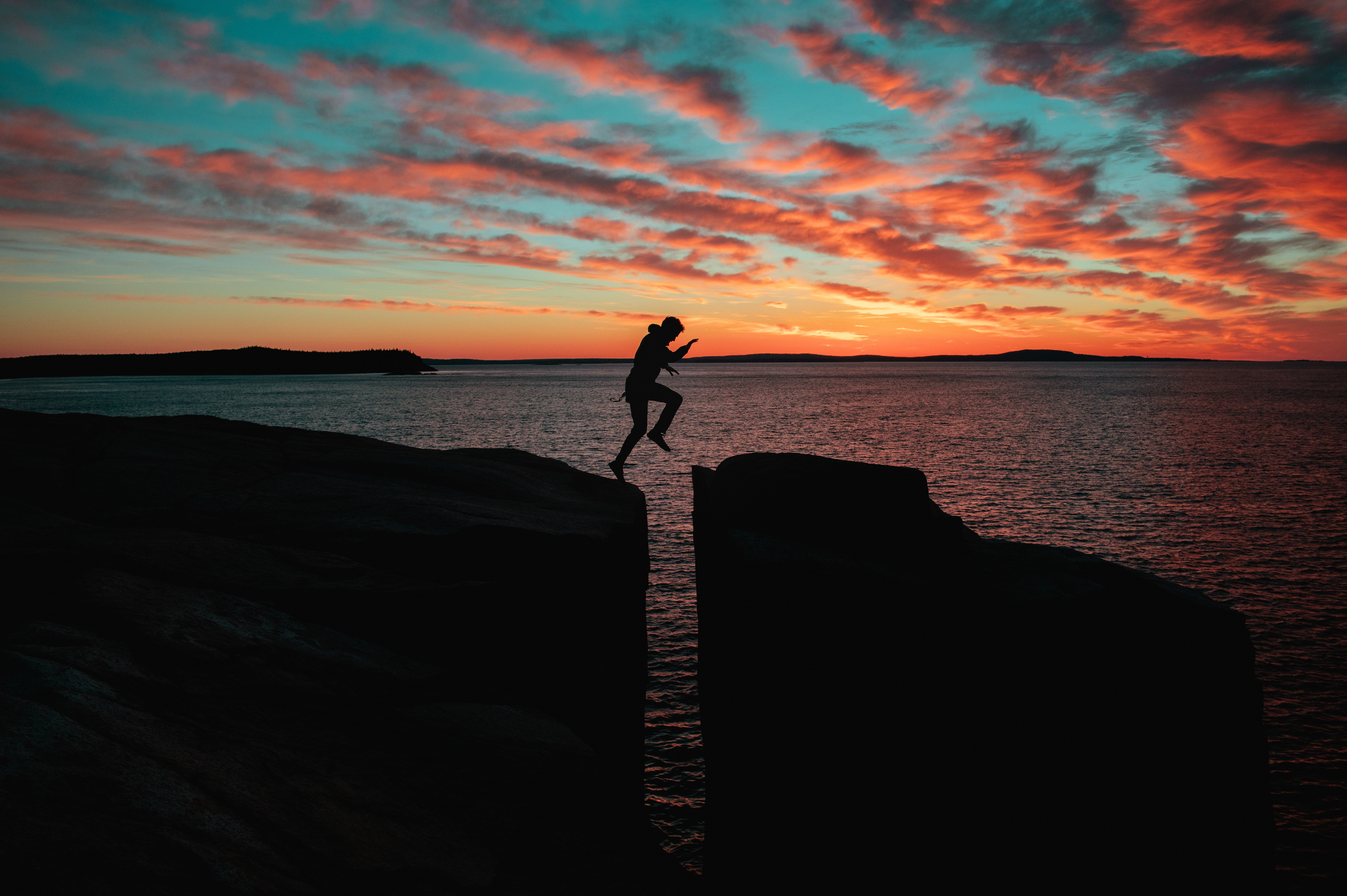 Silhouette Of Man Jumping Over Cliff HD Wallpaper Wallpaper Flare