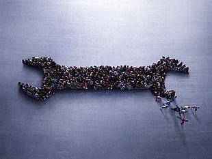 people forming open wrench top view photography, artwork, people