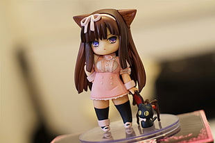 brown haired girl anime character toy
