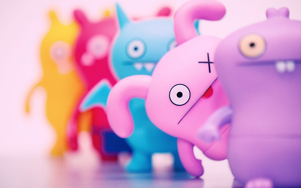 selective focus photo of pink monster animated illustration HD wallpaper