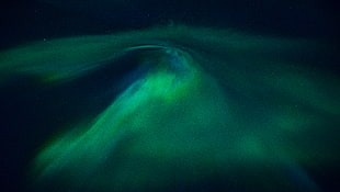 green Aurora Borealis on the sky