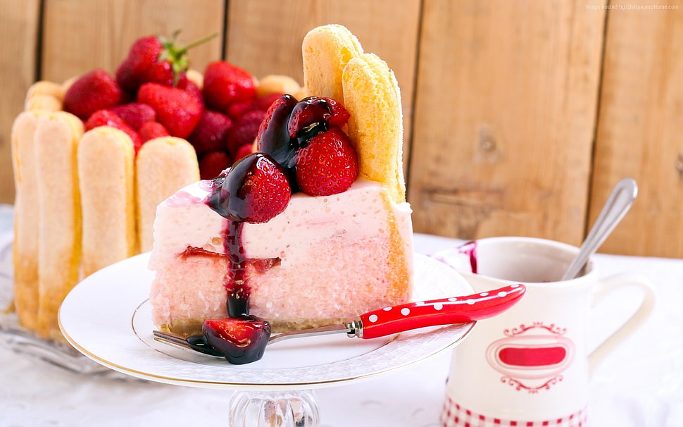 strawberry on top moist cake served on white ceramic plate HD wallpaper