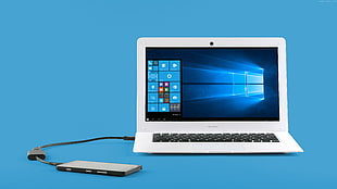 white laptop computer and black external hard drive screenshot HD wallpaper