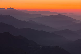 sunset above foggy mountain ranges, hehuanshan
