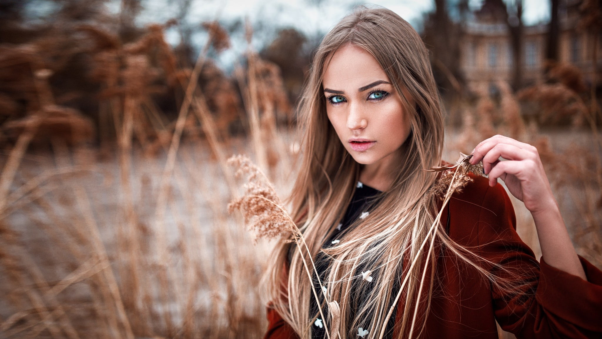 woman wearing red cardigan