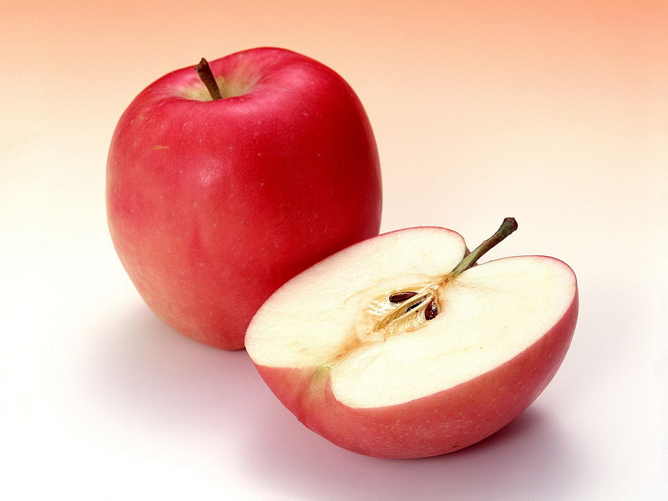 one and a half apple on surface HD wallpaper