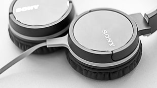 black and gray Sony corded headphones, headphones, headsets, earphones, music