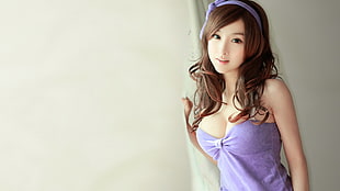 women's purple tube top, Asian, headband, curly hair, women