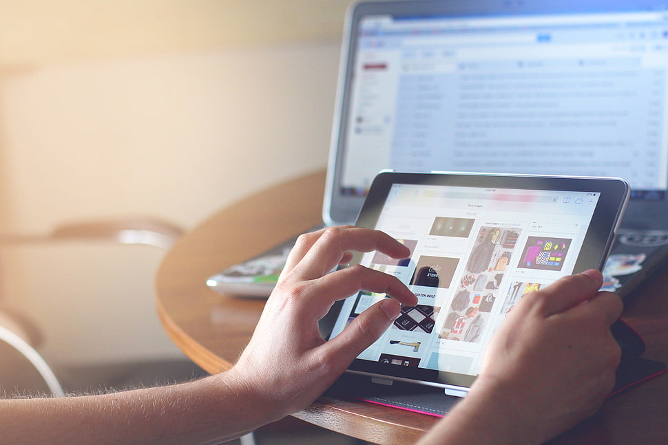 person using tablet computer HD wallpaper