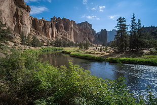 landscape photography of mountain near the lake, crooked river