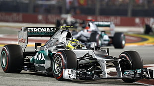 gray and green Petronas F1 car photo HD wallpaper