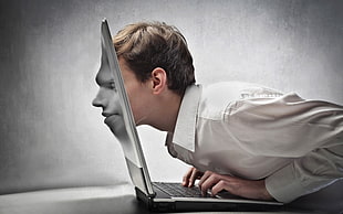 man with face on laptop computer 3D wallpaper