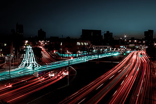 time-lapsed photo of vehicle passing through road during night time, long exposure, photography, cityscape