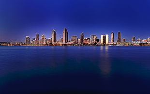 view of high rise buildings across body of water