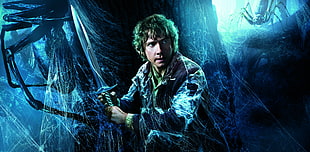 movie poster showing man holding sword HD wallpaper