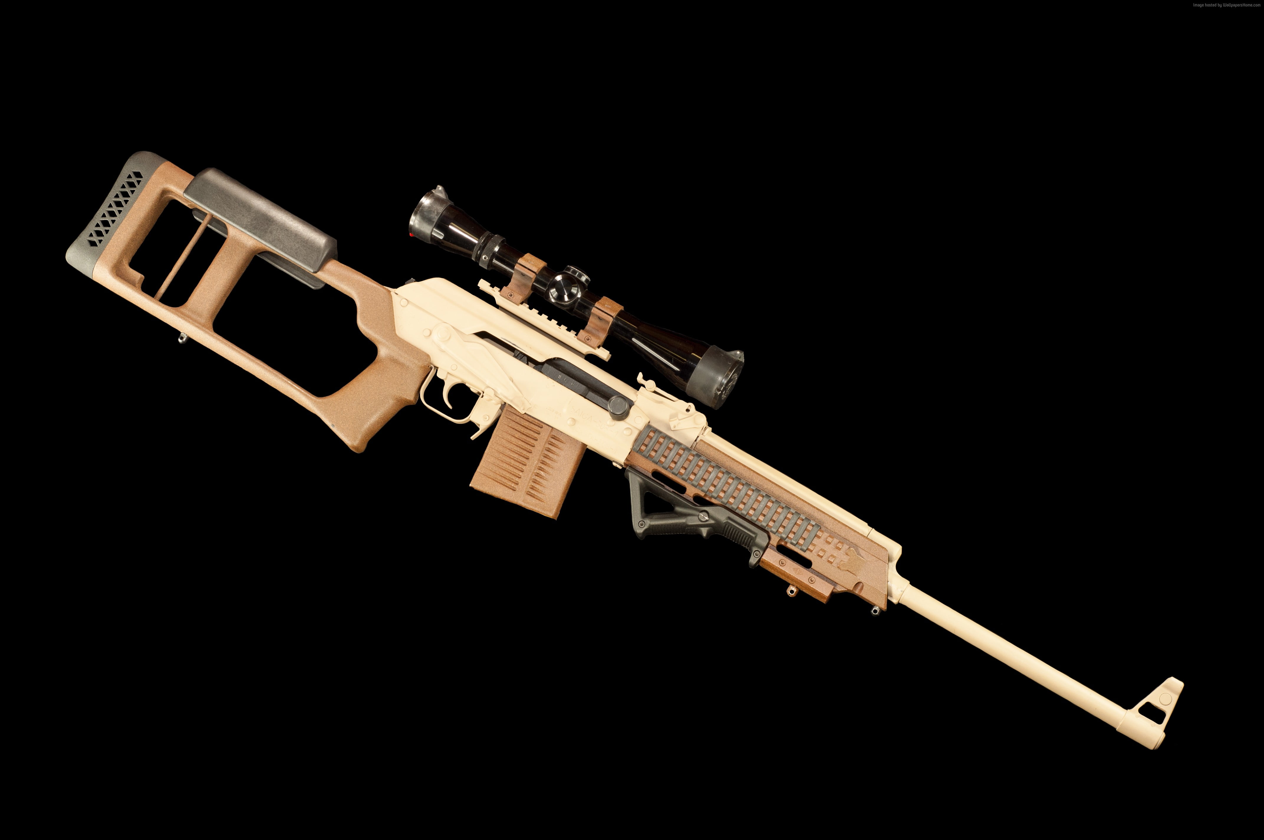 beige and white assault rifle with scope