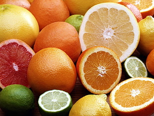 sliced citrus fruits HD wallpaper