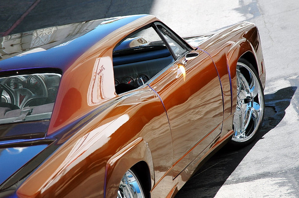 classic orange coupe on gray concrete road HD wallpaper