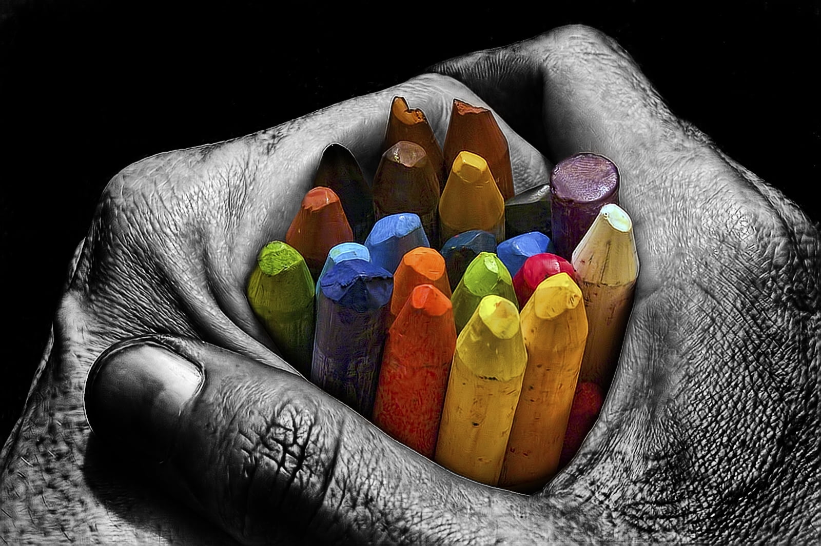 person holding crayons