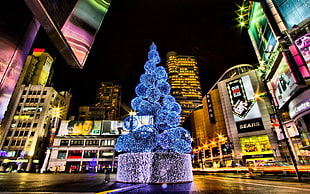 blue and purple pine tree decor, Christmas, New Year, city lights, night