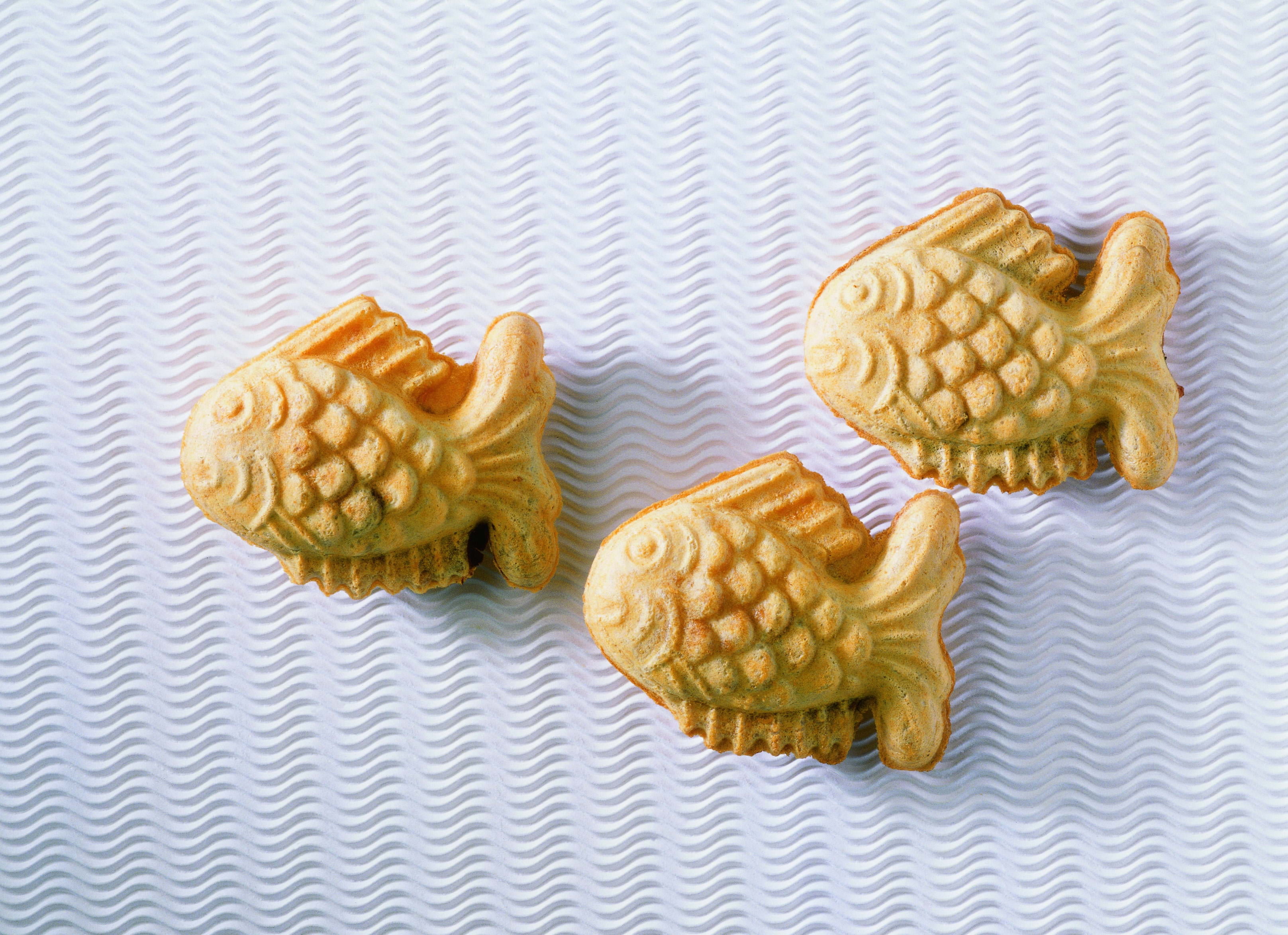 three brown Fish crackers