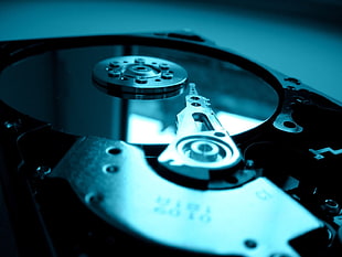 close-up photography of computer hard disk drive