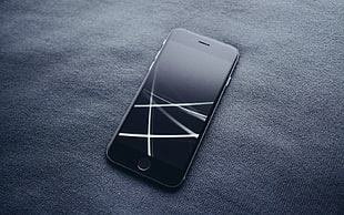 space gray iPhone 6 on textile HD wallpaper