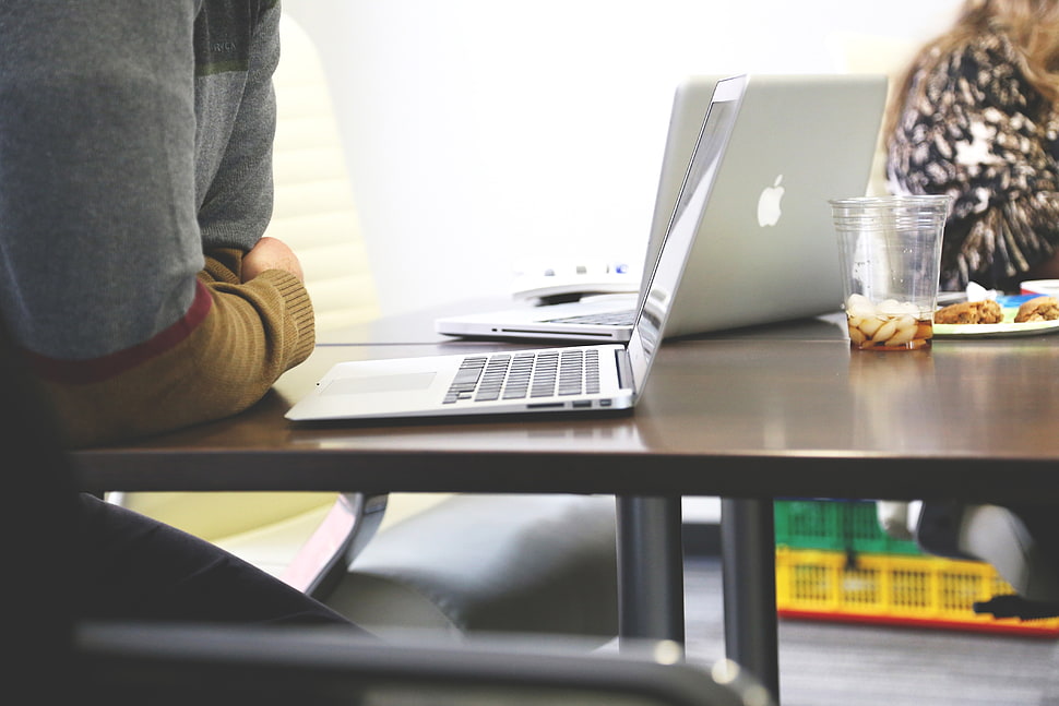 person facing laptop computer HD wallpaper