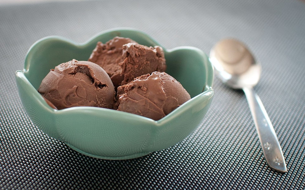 Chocolate ice cream on green ceramic bowl with stainless steel spoon HD wallpaper