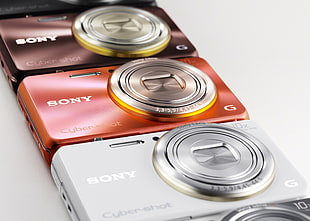 brown, red, and silver Sony digital cameras HD wallpaper