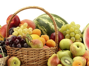brown woven basket with assorted fruits