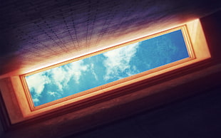 low angle photography of inside the building skies