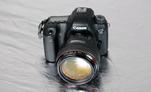 black Canon EOS 6D on gray surface