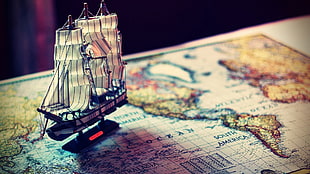 sail ship miniature on map