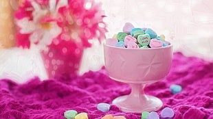pink cup filled with marshmallows