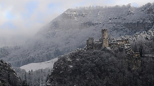 bird's eye photography of gray castle beside cliff HD wallpaper