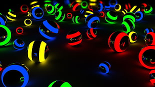 photo green, blue, black, red, and yellow LED balls