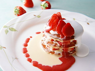 strawberry cake on ceramic plate