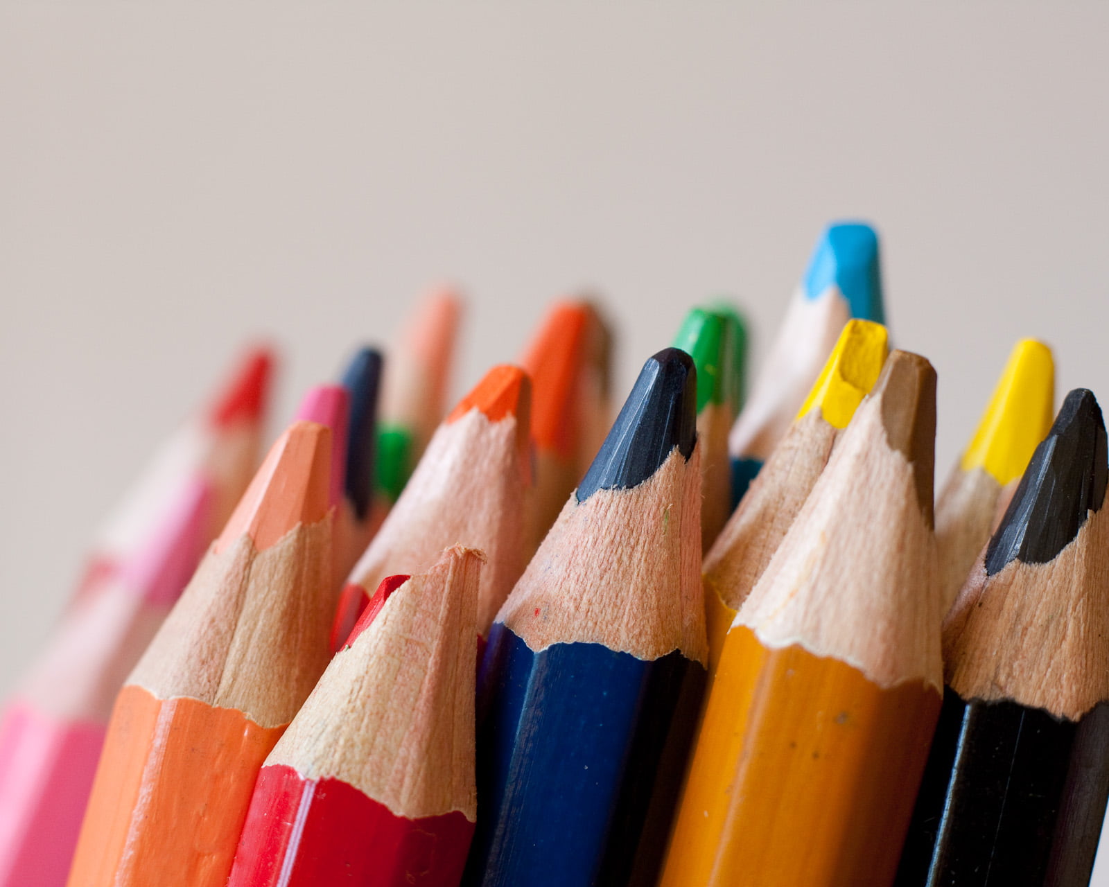 selective focus photography of blue color pencil