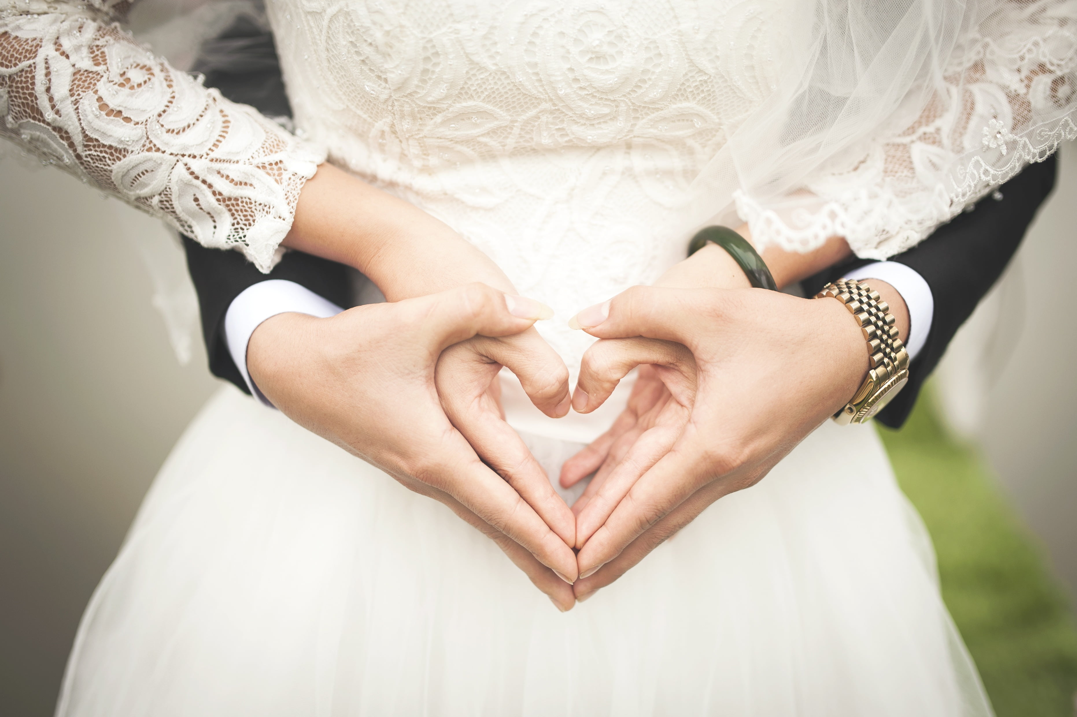 Couple In Wedding Attire Both Hands In Heart Forms Hd Wallpaper