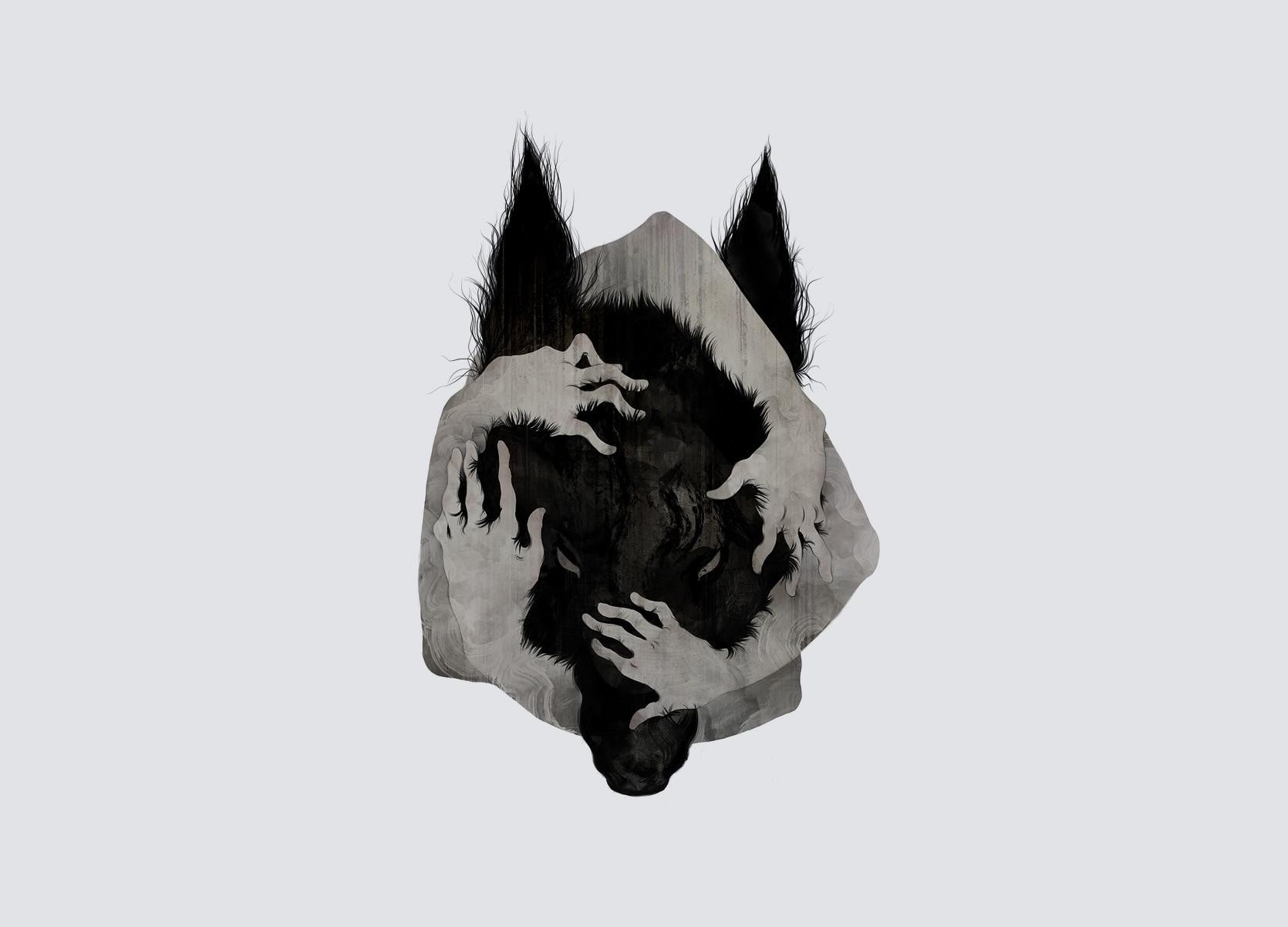 black and grey wolf and hand logo
