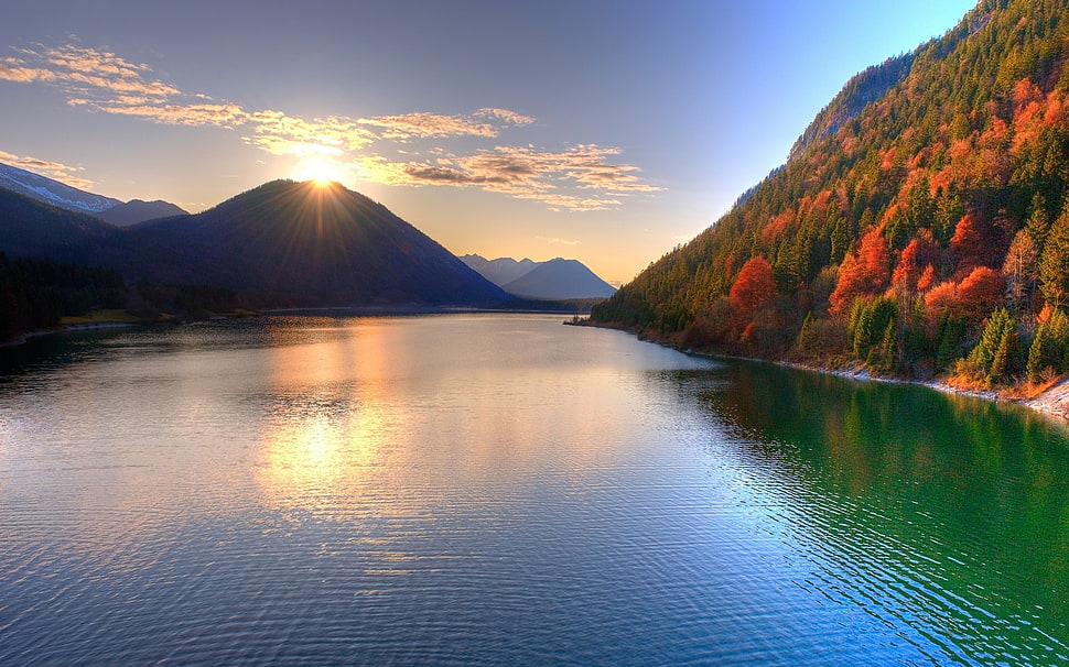 silhouette of mountain during sunset HD wallpaper