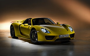 yellow Porsche sports coupe HD wallpaper