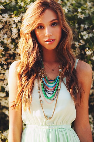 women's teal and white sleeveless pleated top, Alexis Ren, women, necklace, sunlight