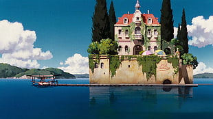 beige, white, and red concrete castle on body of water