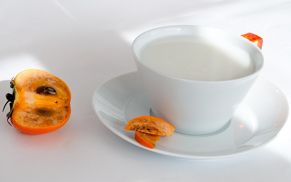 white ceramic mug with white liquid and fruit HD wallpaper