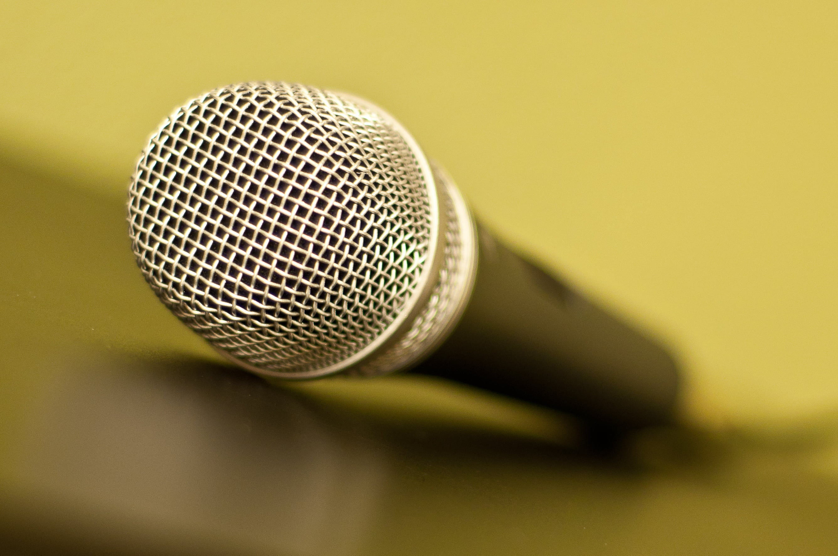 selective focus photography of dynamic microphone
